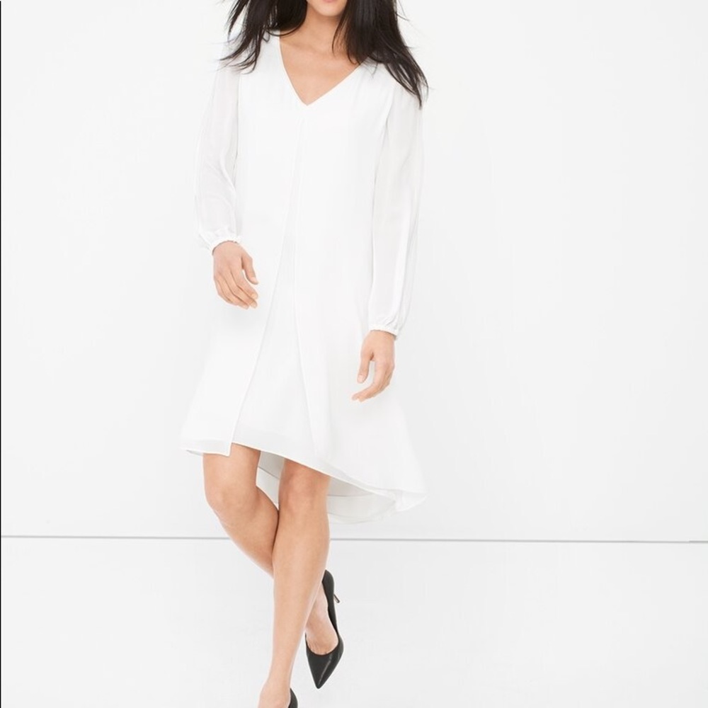 White dress with open sleeves